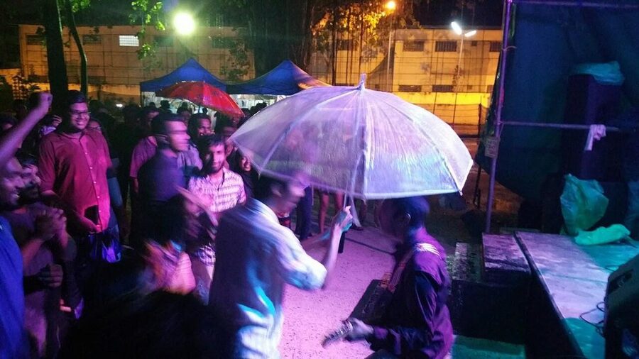 Dancing under a clear umbrella in the rain